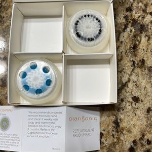 Two Clarisonic replacement brush heads: 1 sensitive and 1 deep pore cleansing